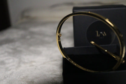 Brățară model Cartier Love aurie cu Șurubelniță