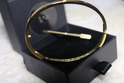 Brățară model Cartier Love aurie cu Șurubelniță